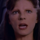 Mira Furlan looks shocked at Delenn in Babylon 5.
